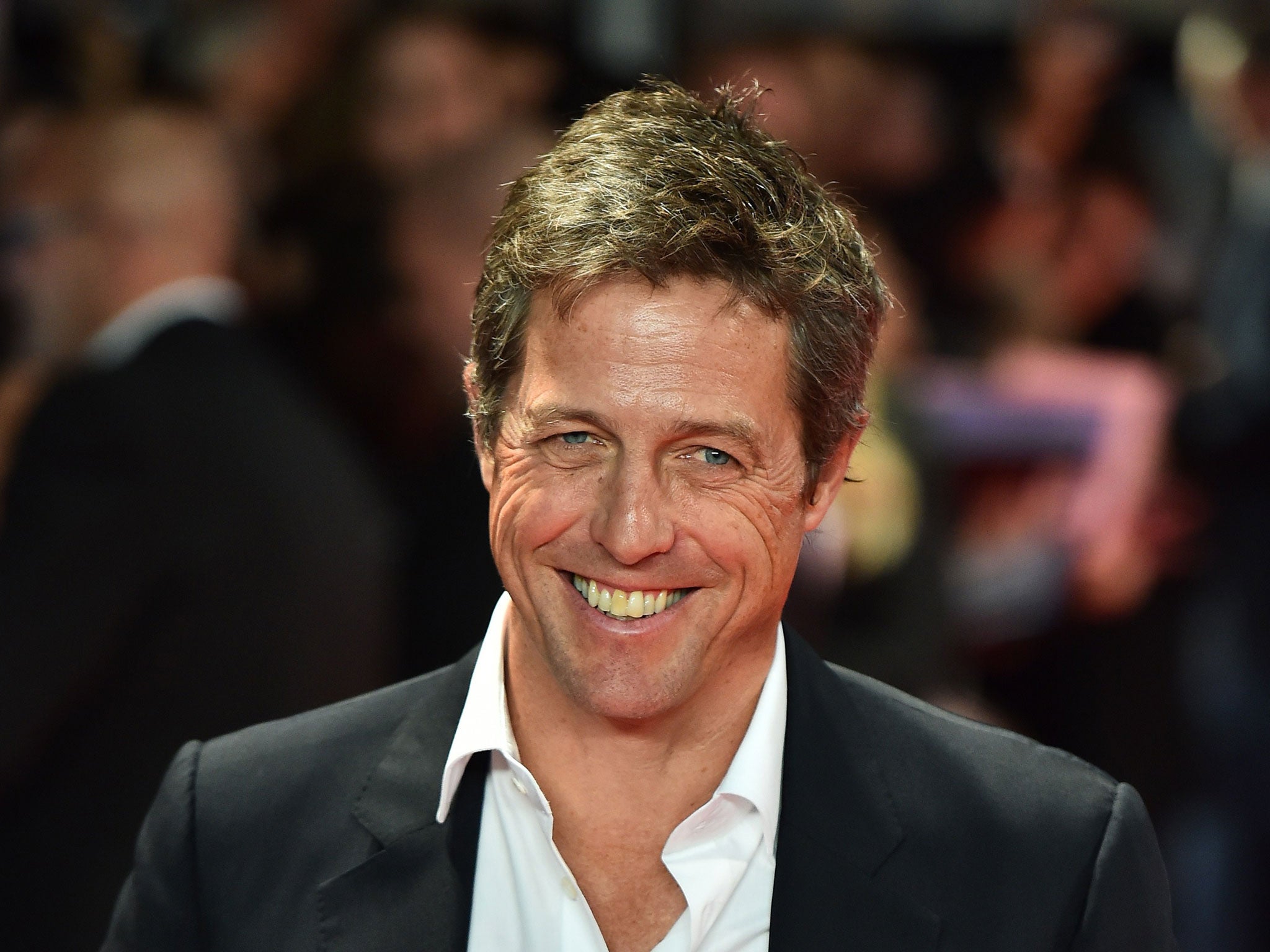 Hugh Grant plays struggling screenwriter Keith Michaels in The Rewrite