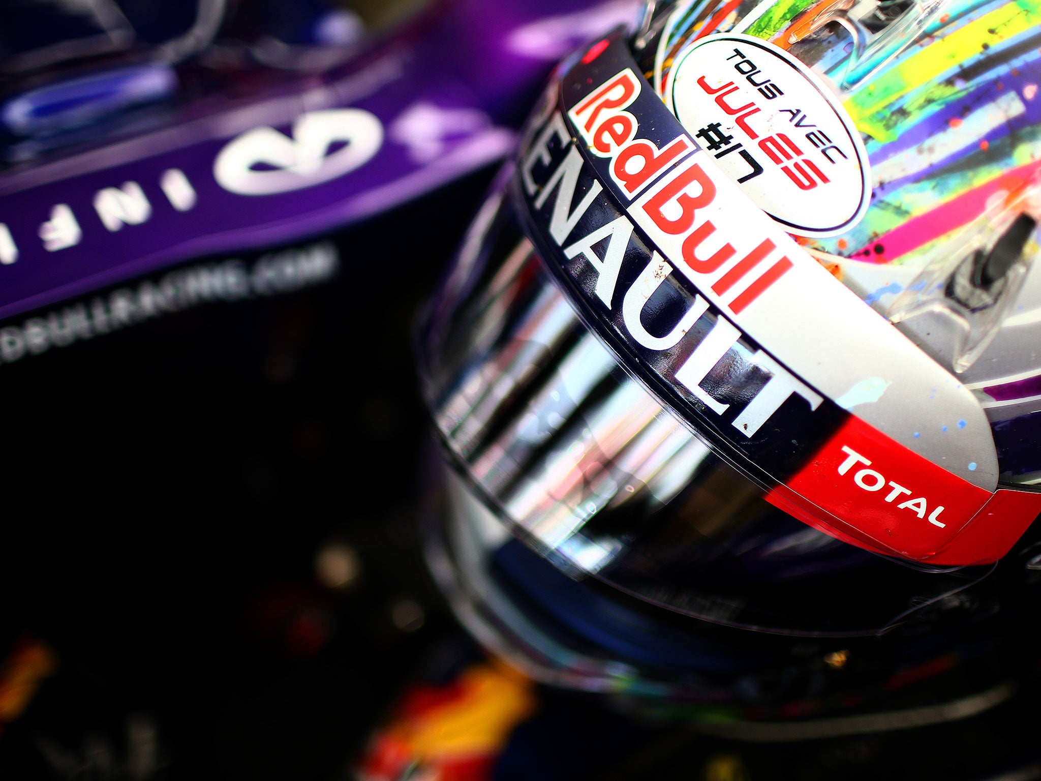 Sebastian Vettel's helmet shows the tribute to Jules Bianchi, which reads 'All with Jules'