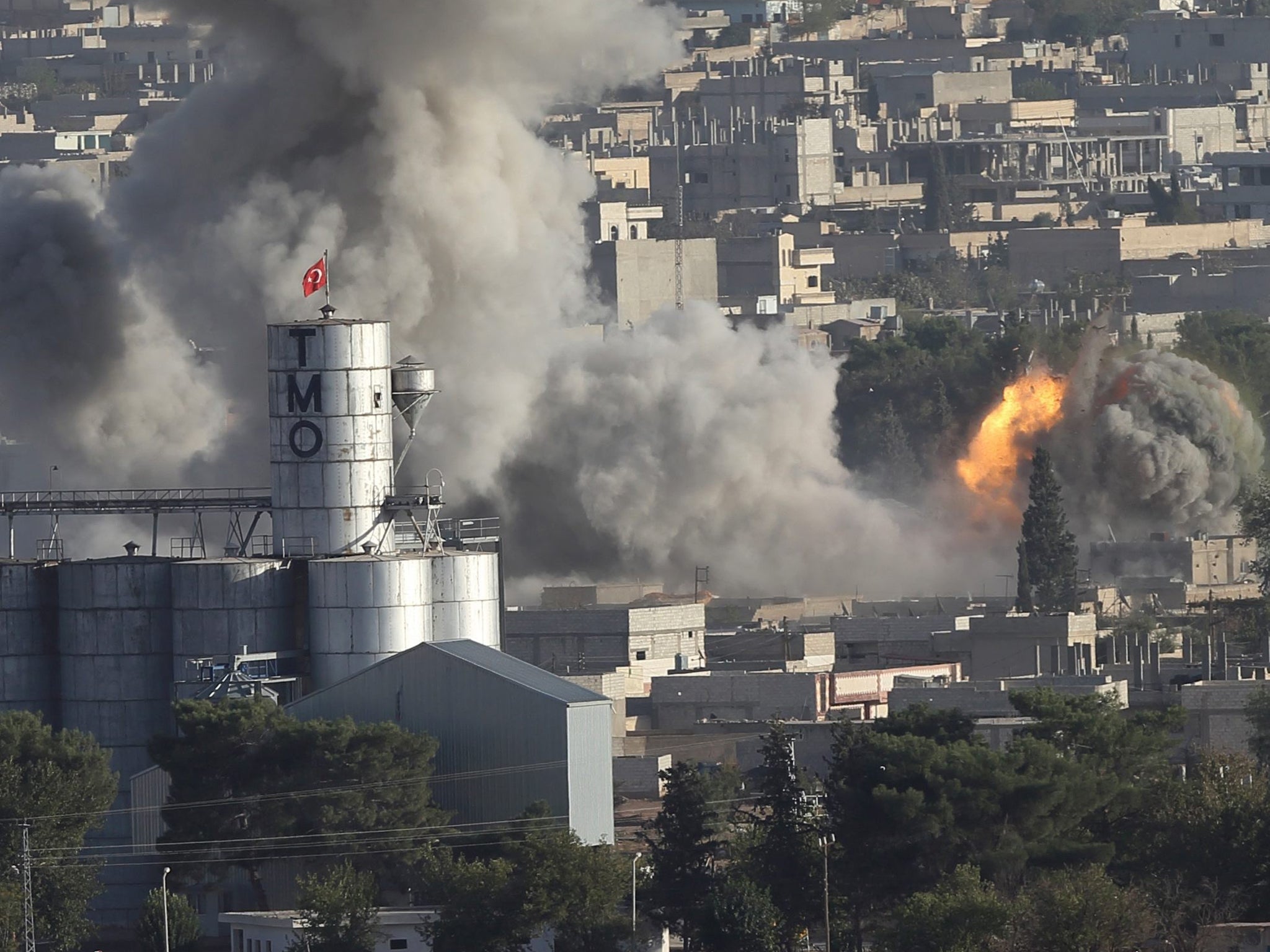 Smoke rising from Kobani during clashes between Isis and Kurdish fighters