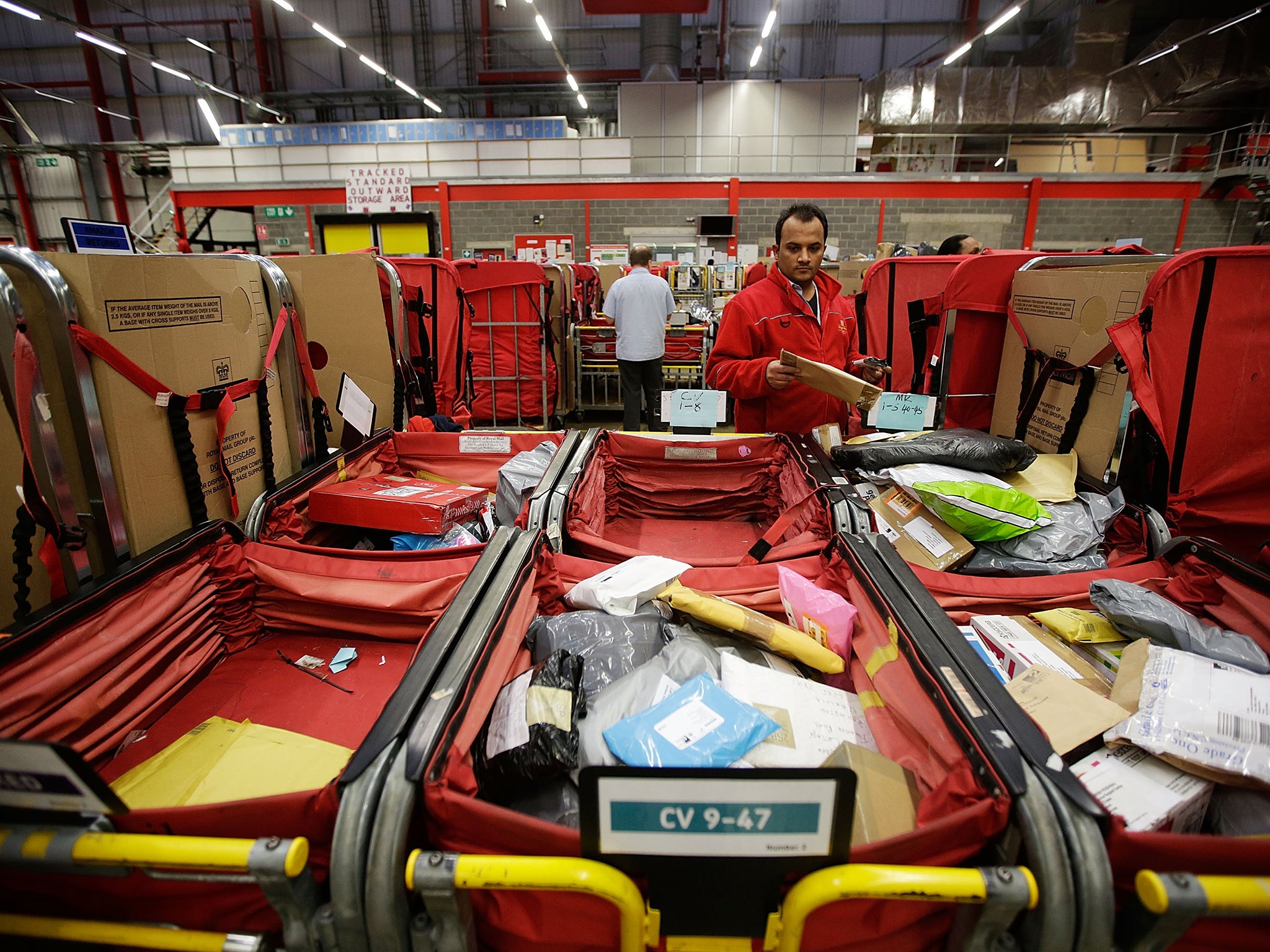 Staff at work in the packet and parcel section of the Royal Mail's Swan Valley mail centre