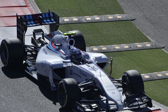Valtteri Bottas negotiates the newly-installed speed bumps at turn two