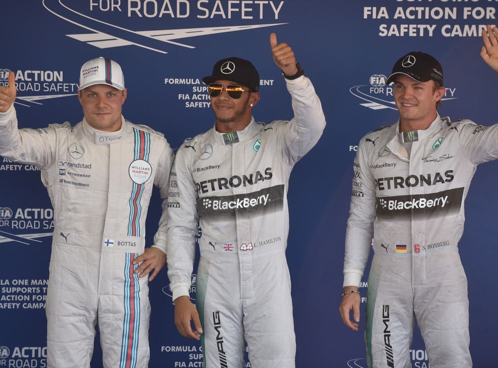 <p>Lewis Hamilton (centre) has labelled Valtteri Bottas (left) as his best teammate </p>
