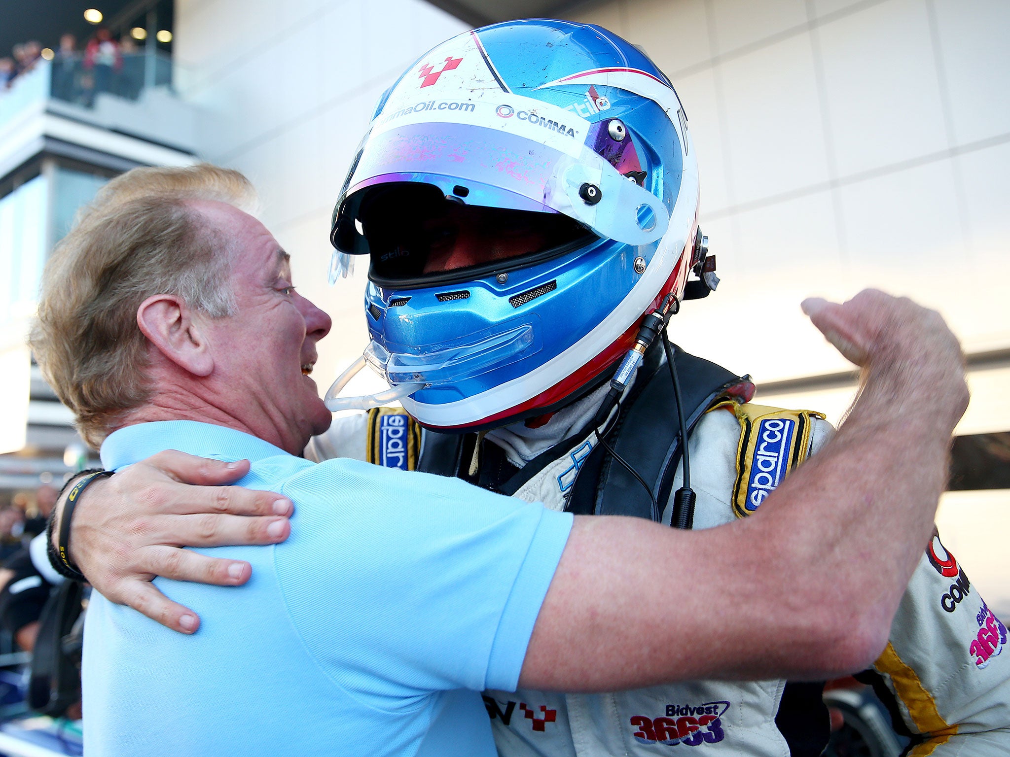 Jonathan Palmer congratulates his son Jolyon after winning the GP2 championship