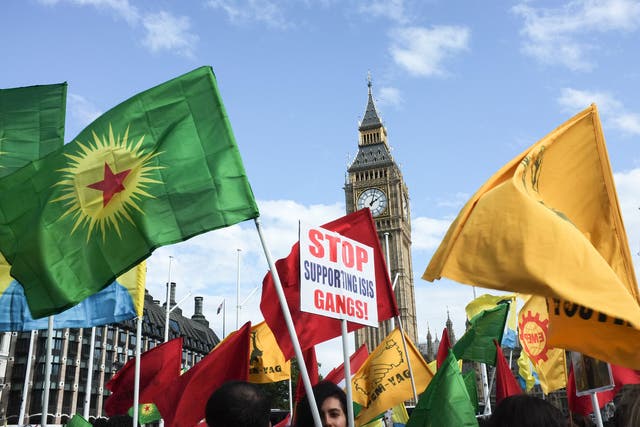 Thousands of people from London's Kurdish community turn out to protest against ISIS, in London