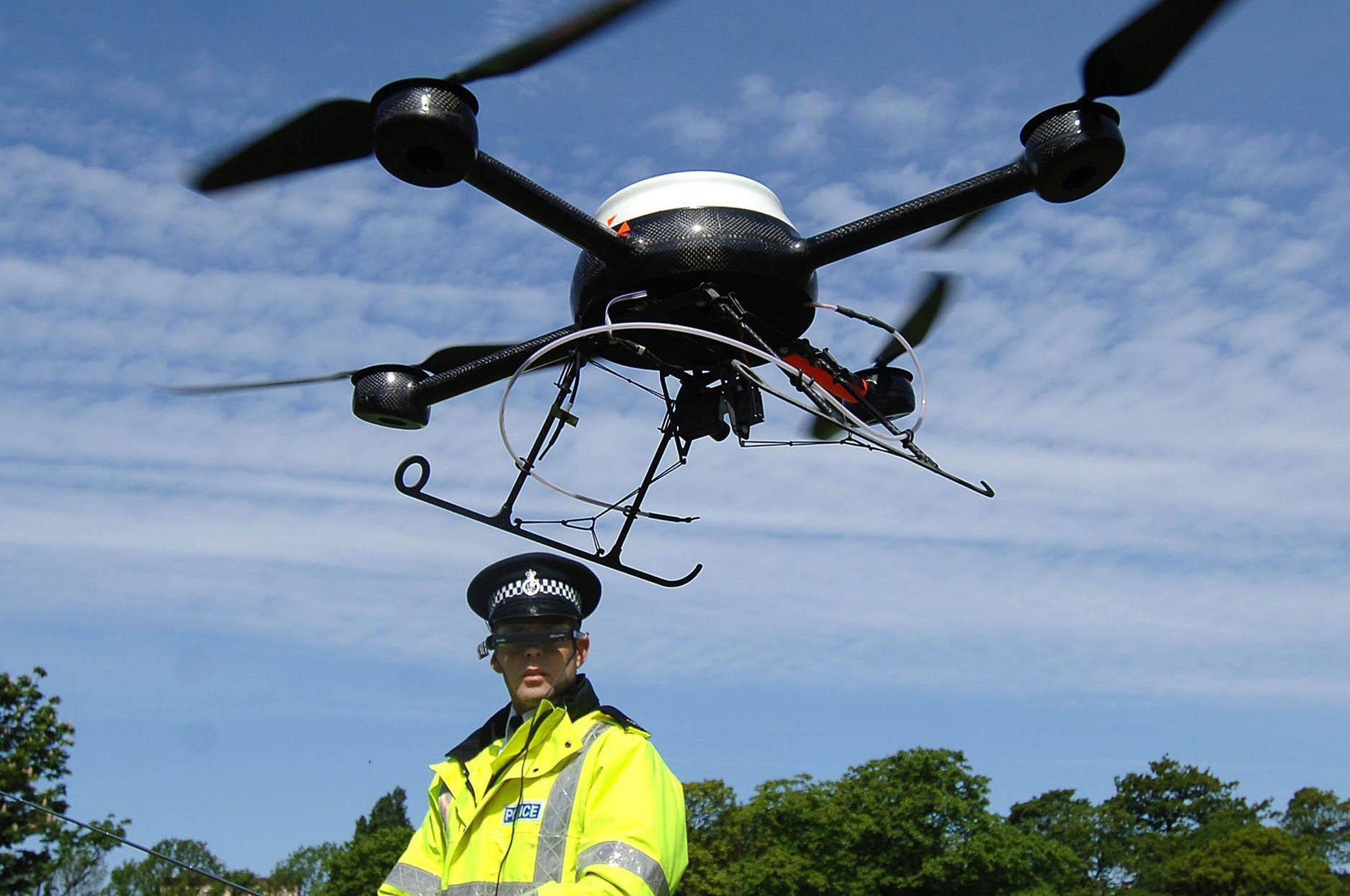 PC Derek Charlton of Merseyside Police operates their new aerial surveillance drone in Liverpool