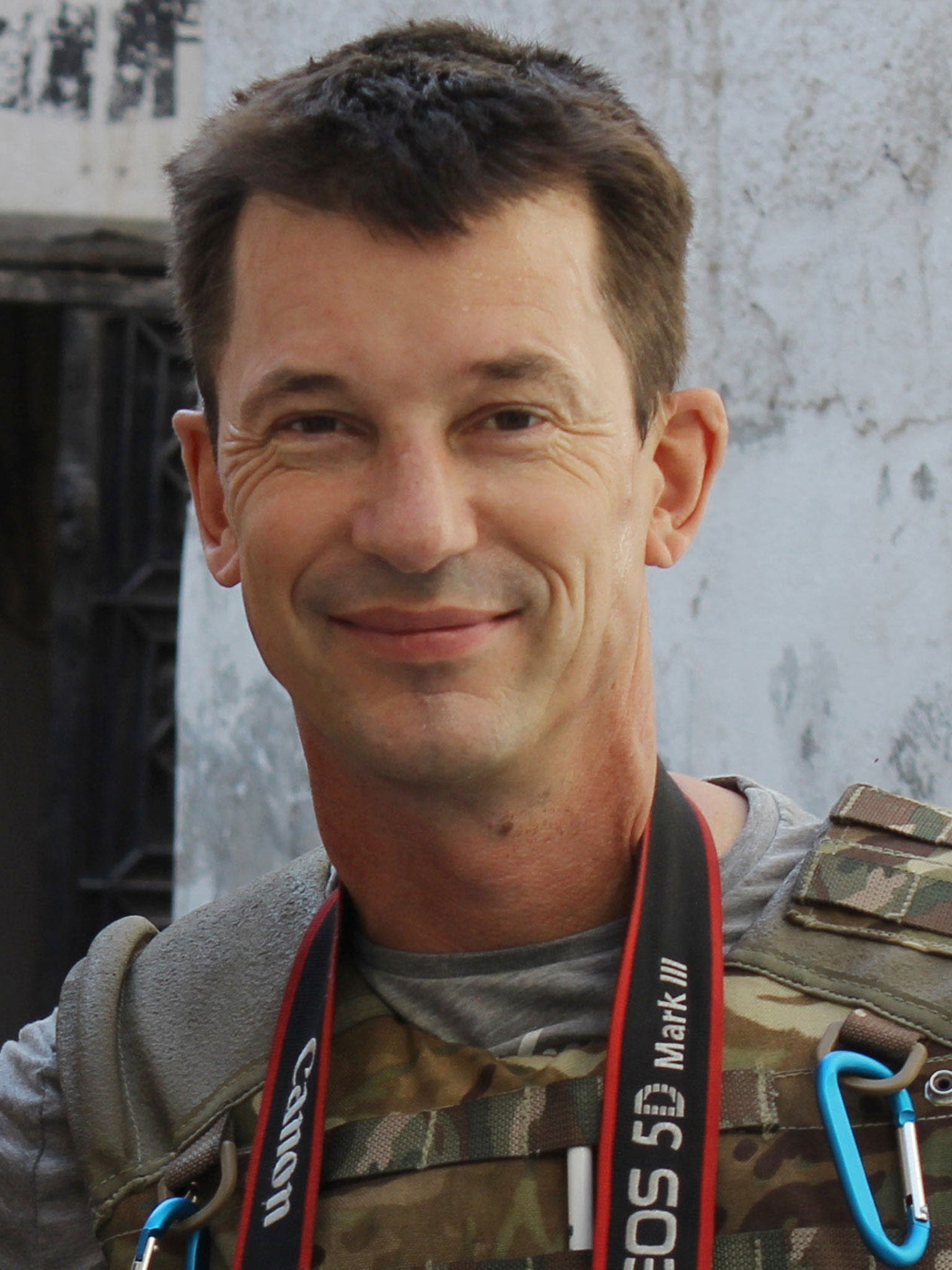 Photojournalist John Cantlie pictured in Aleppo, Syria, in 2012 AP