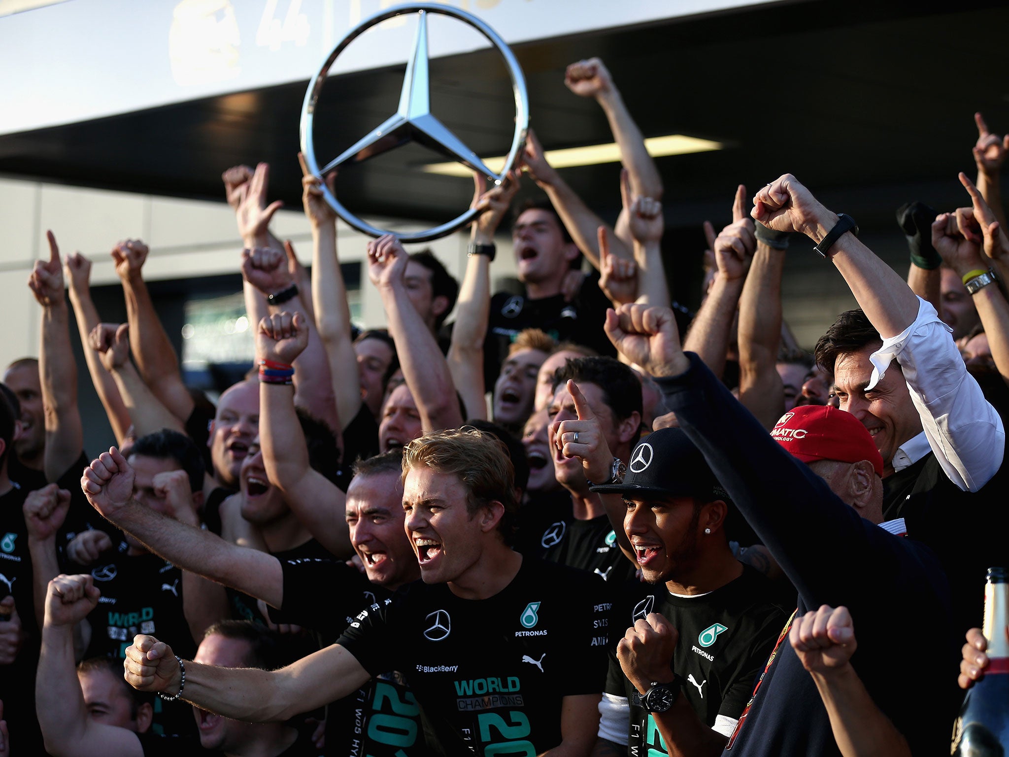The Mercedes team celebrate winning the Constructors' Championship