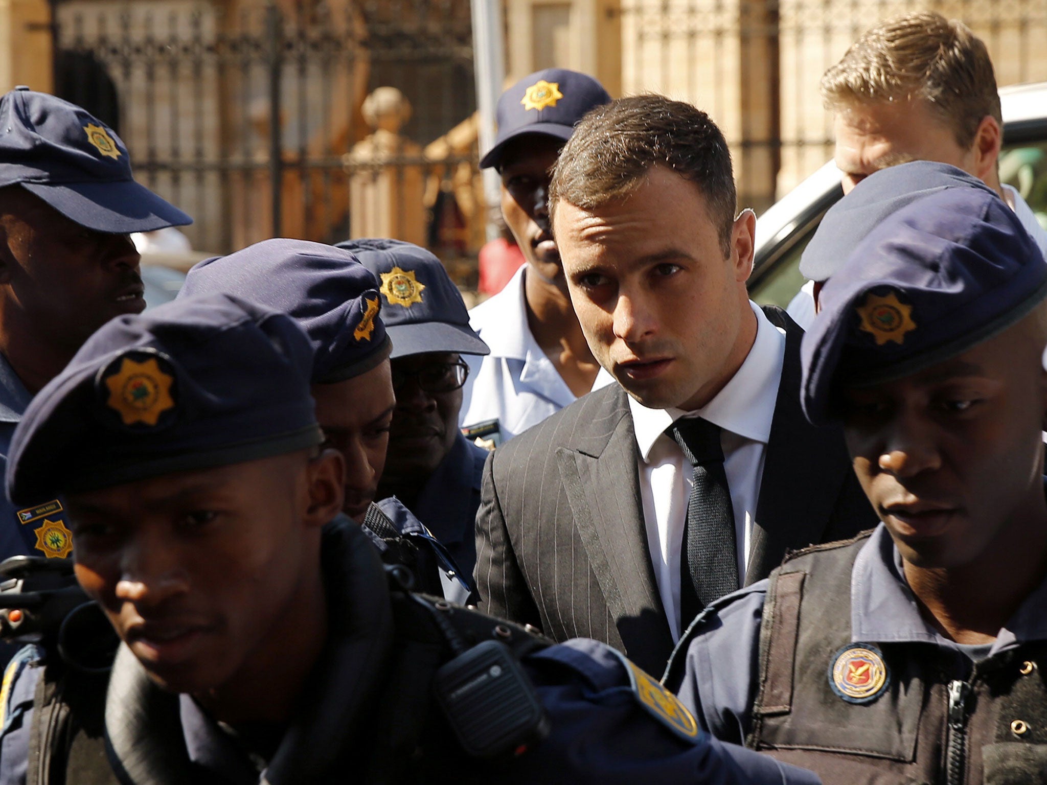 Olympic and Paralympic track star Oscar Pistorius arrives ahead of his sentencing at the North Gauteng High Court in Pretoria on Monday, October 13