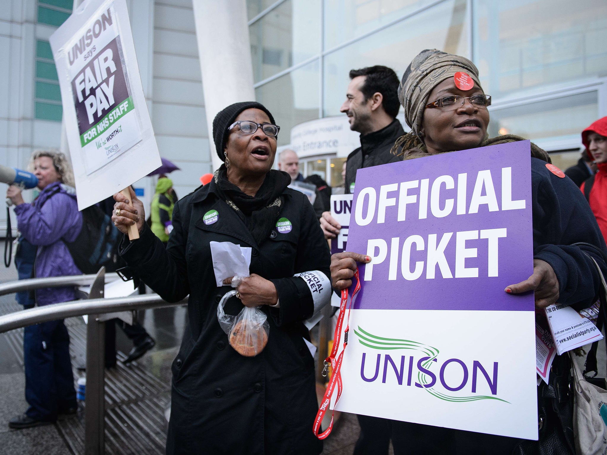 NHS workers strike outside University College Hospital in central London