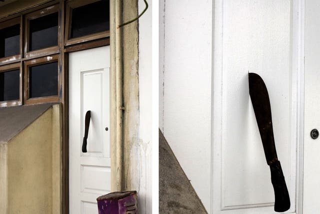 A knife lodged into a door belonging to Minivan News