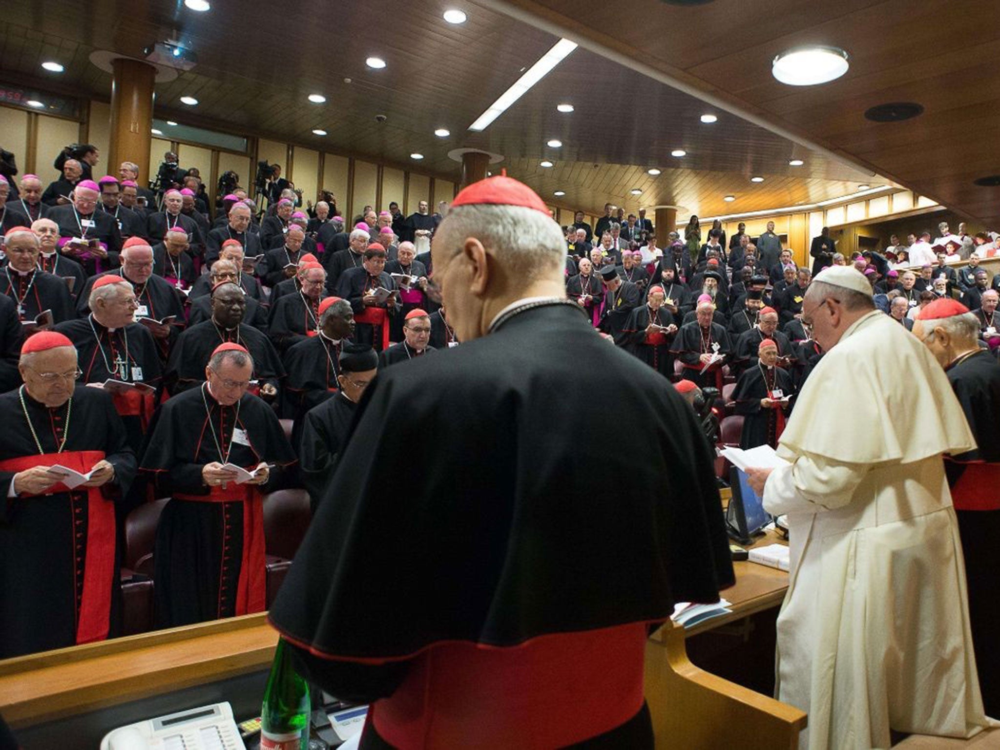 Pope Francis (R) delivering his speech in the Synod Aula at the Vatican on 6 October, 2014