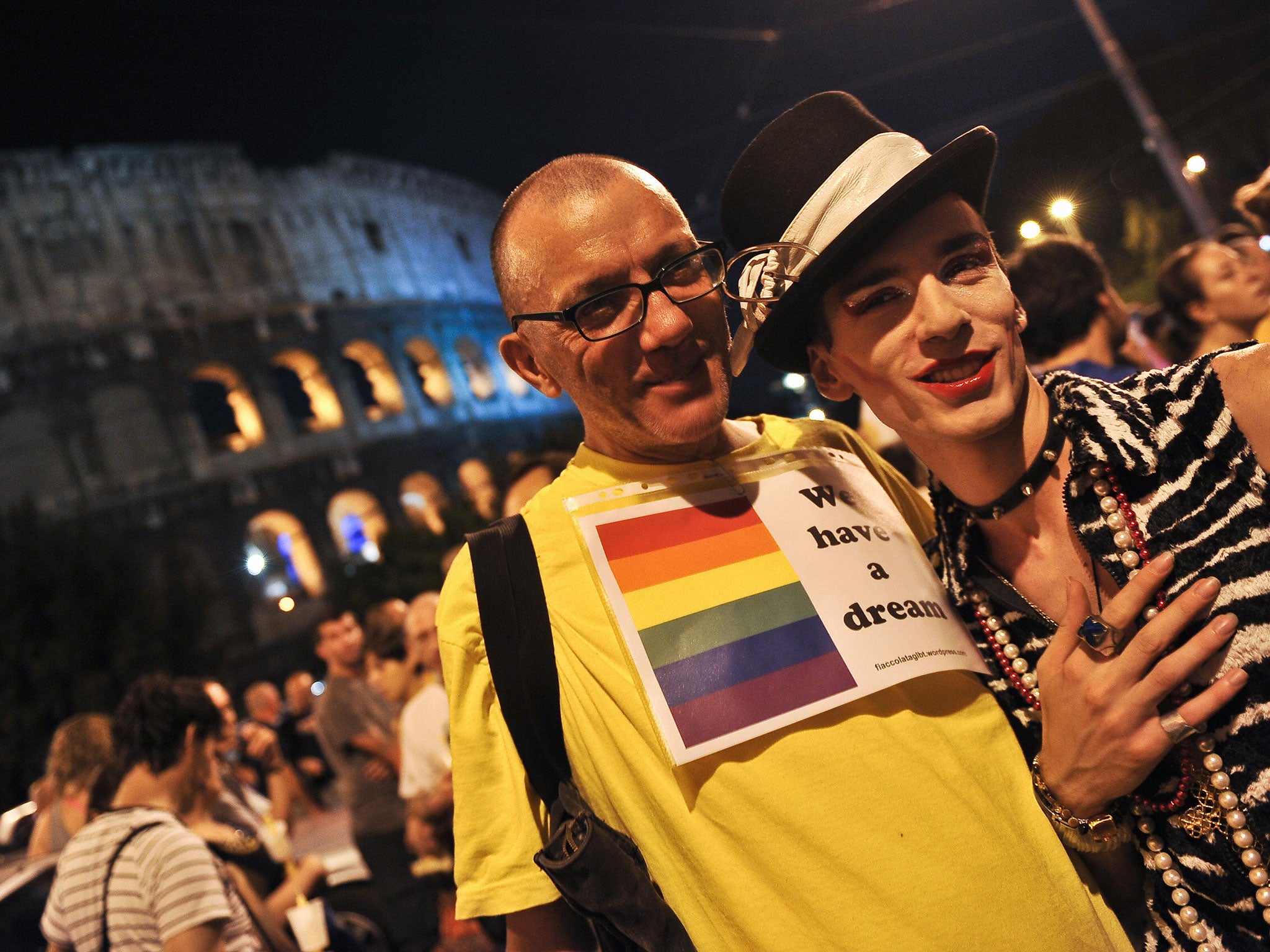 Italian gay rights supporters outside the Colosseum during a protest in 2009 against an increasing number of homophobic attacks