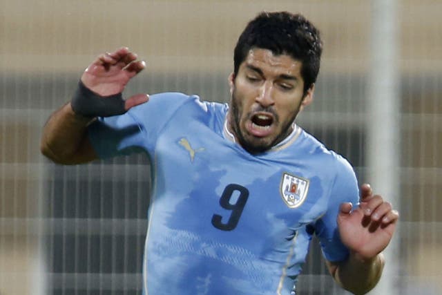 Luis Suarez in action for Uruguay against Oman