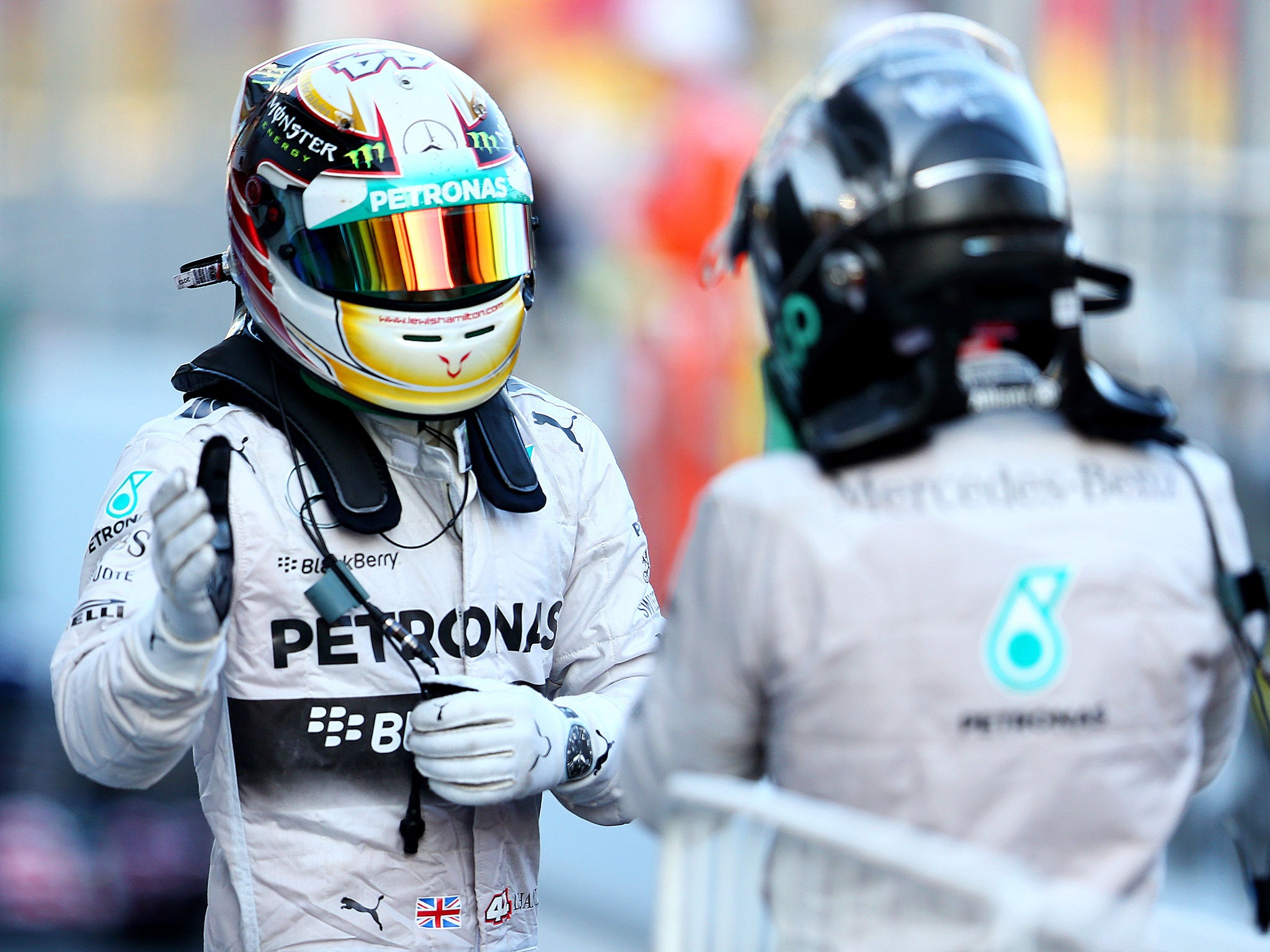 Lewis Hamilton shakes hands with Nico Rosberg after the Russian Grand Prix