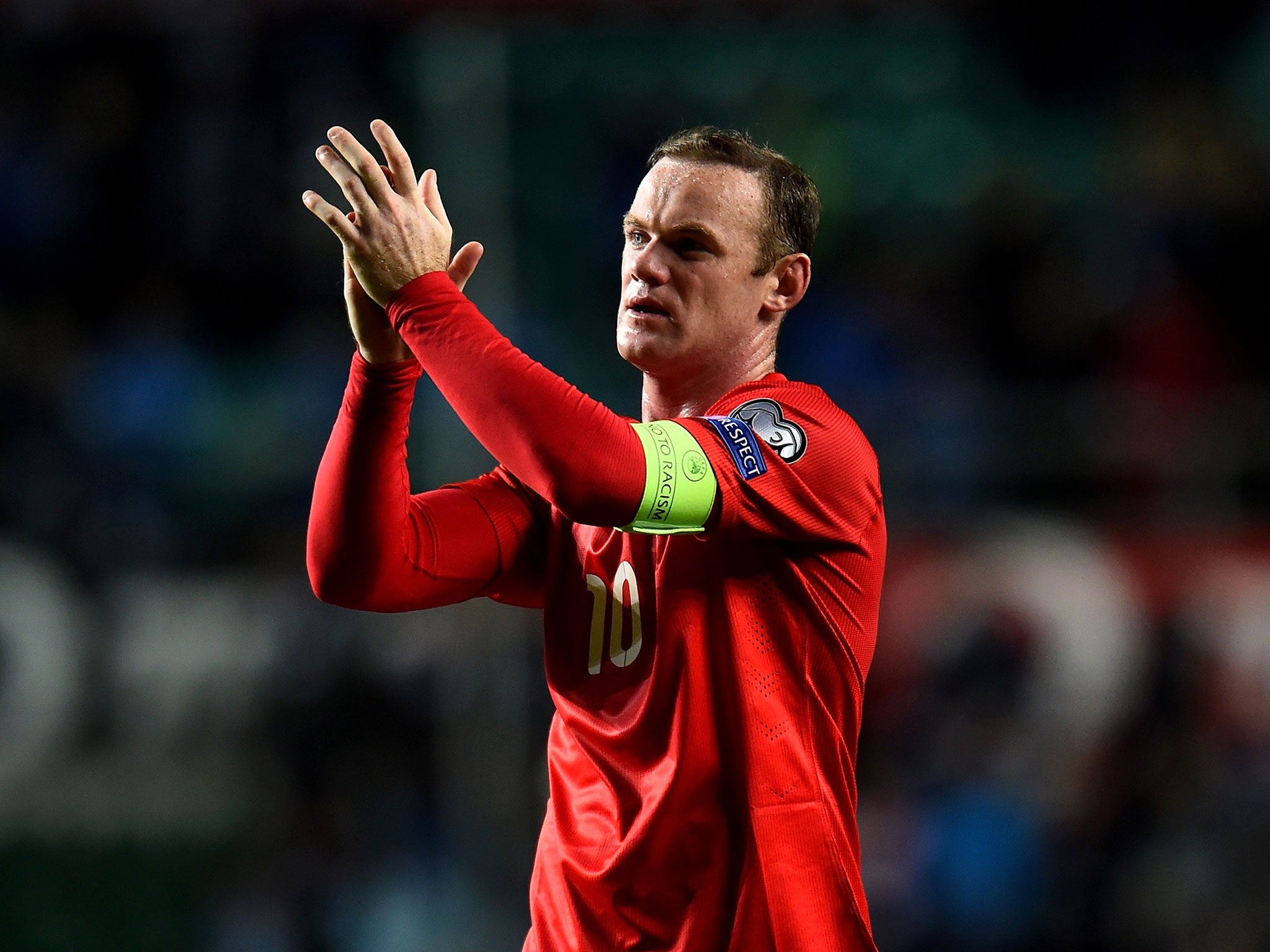 Rooney applauds the England fans after Sunday's 1-0 win over Estonia