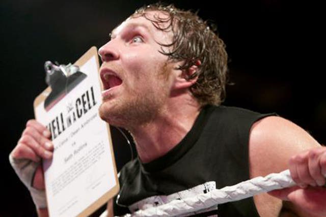 Dean Ambrose grabs the contract to face Seth Rollins at Hell in a Cell