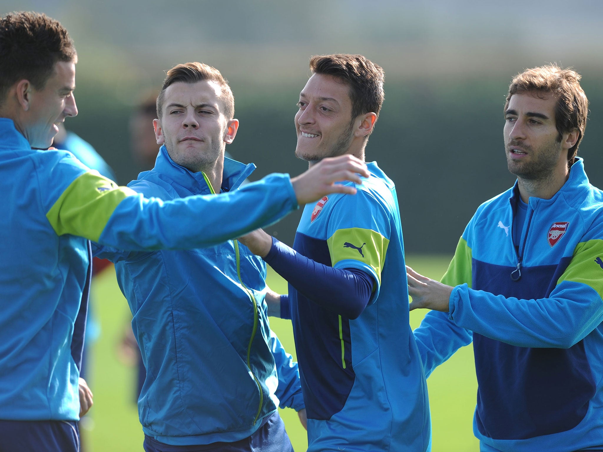 Wilshere claimed the Arsenal squad are 'devastated' after Ozil suffered a knee injury