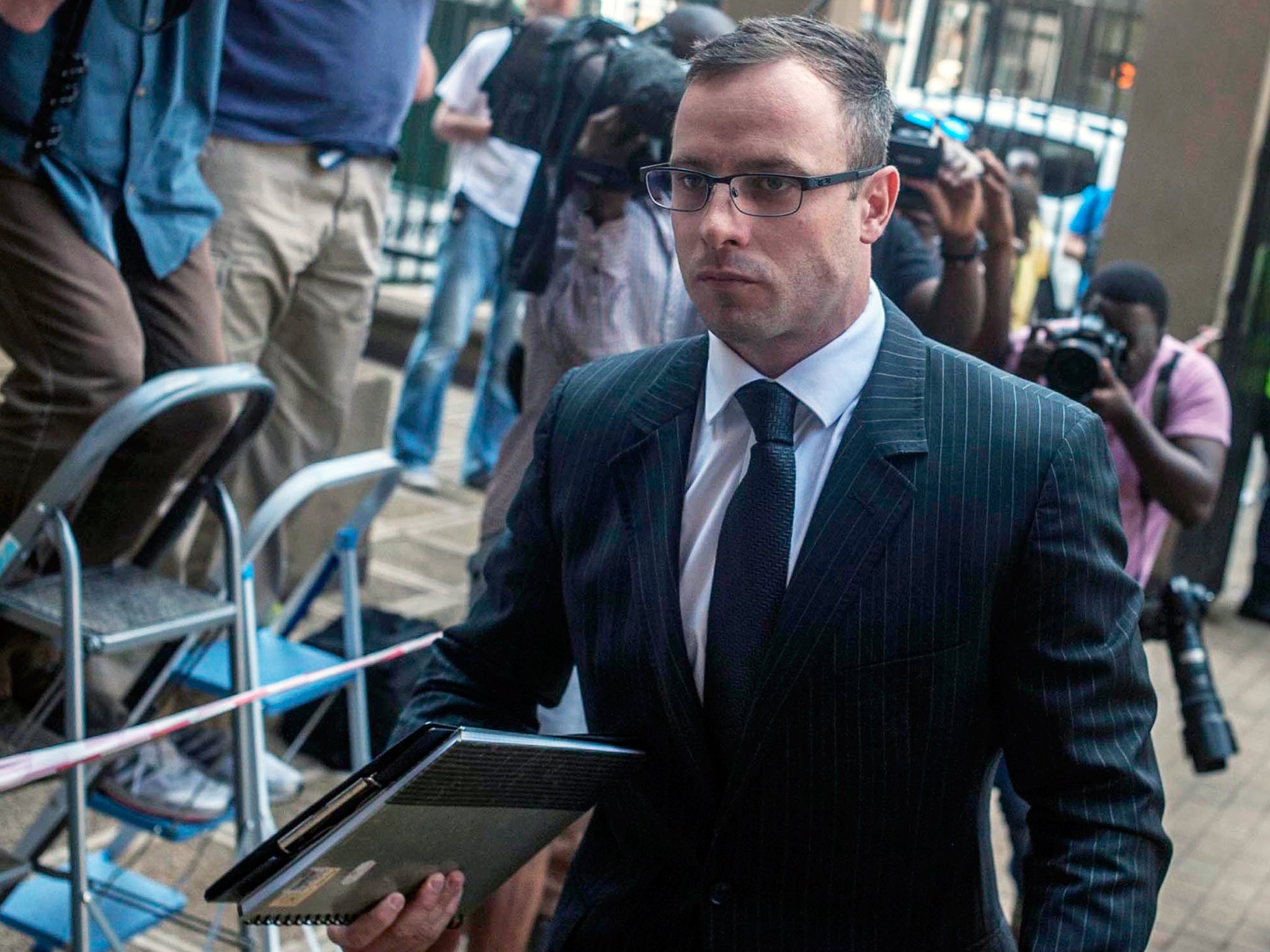 Oscar Pistorius arrives at the High Court for the second day of sentencing in his murder trial in Pretoria
