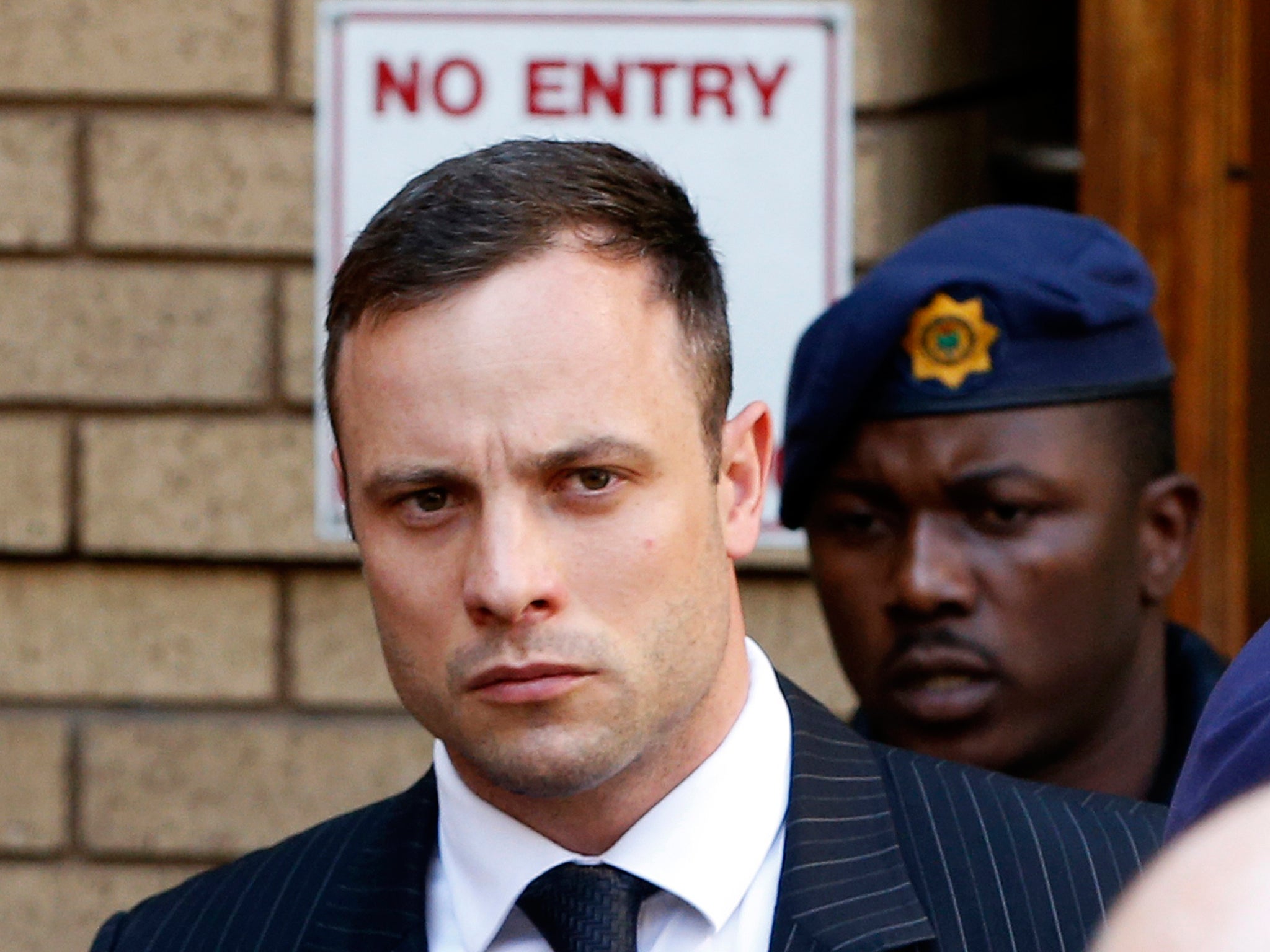 Oscar Pistorius leaves the North Gauteng High Court in Pretoria.