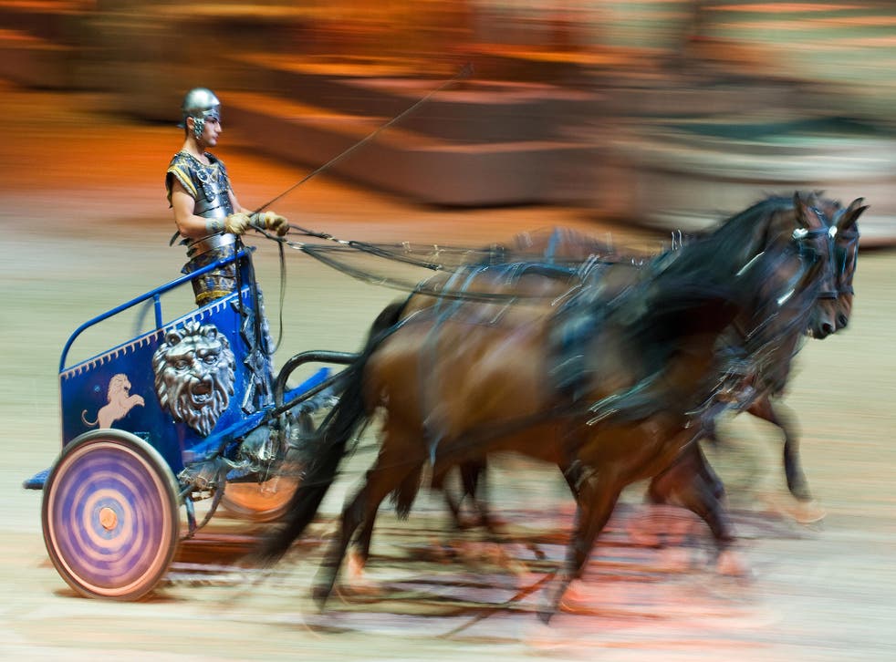 A perfomer rides a chariot at 'Ben Hur Live', at the O2 in London, in 2009