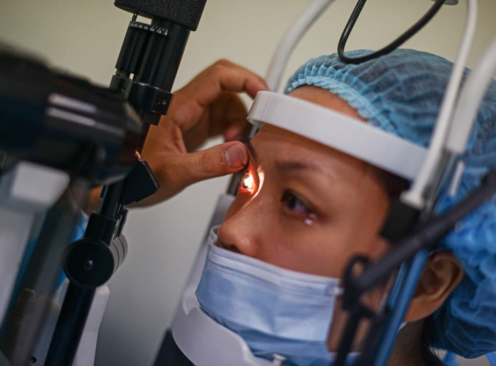 A patient undergoes an eye test. File photo