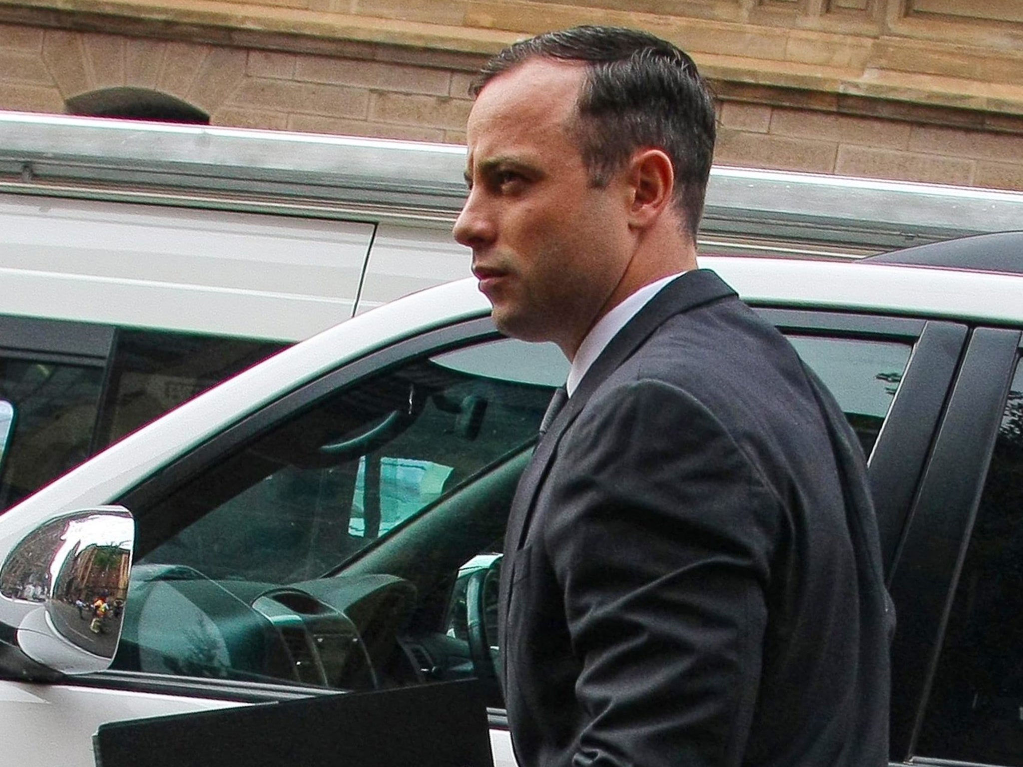 Oscar Pistorius arrives at the High Court in Pretoria, for the third day of sentencing