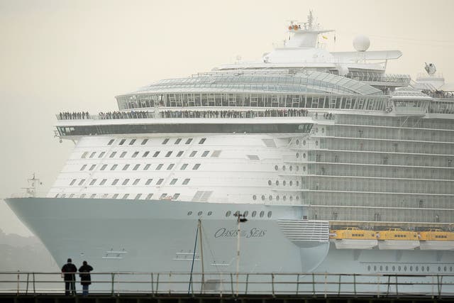 The world's largest cruise ship, MS Oasis of the Seas, owned by Royal Caribbean, makes her way up Southampton Water into Southampton where she will stay for a day before heading to the US