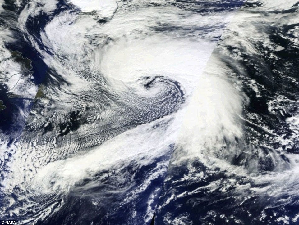 A huge storm system is seen developing across the Atlantic