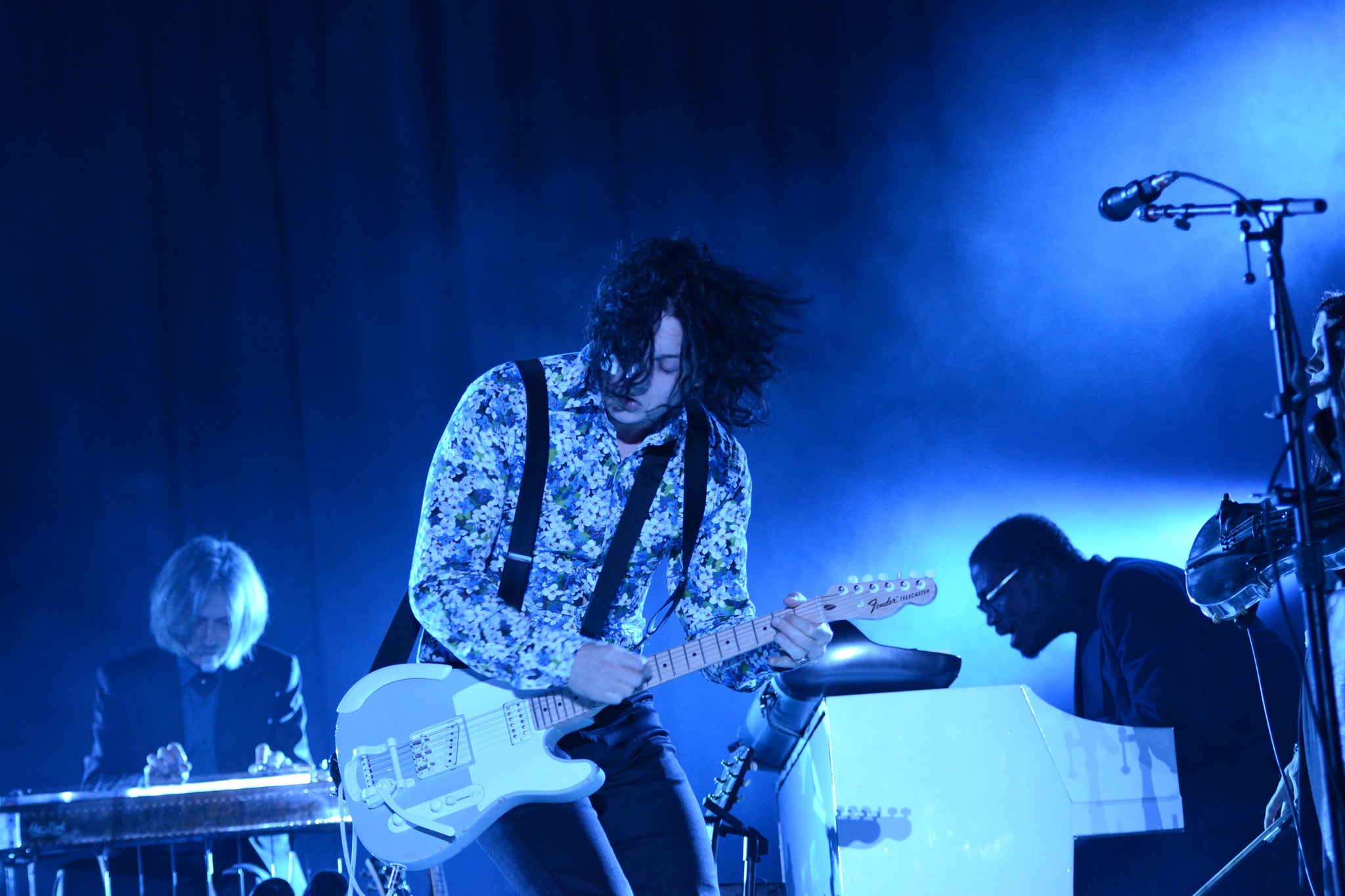 Keyboard player Isaiah 'Ikey' Owens, who has died aged 38, is seen here behind Jack White