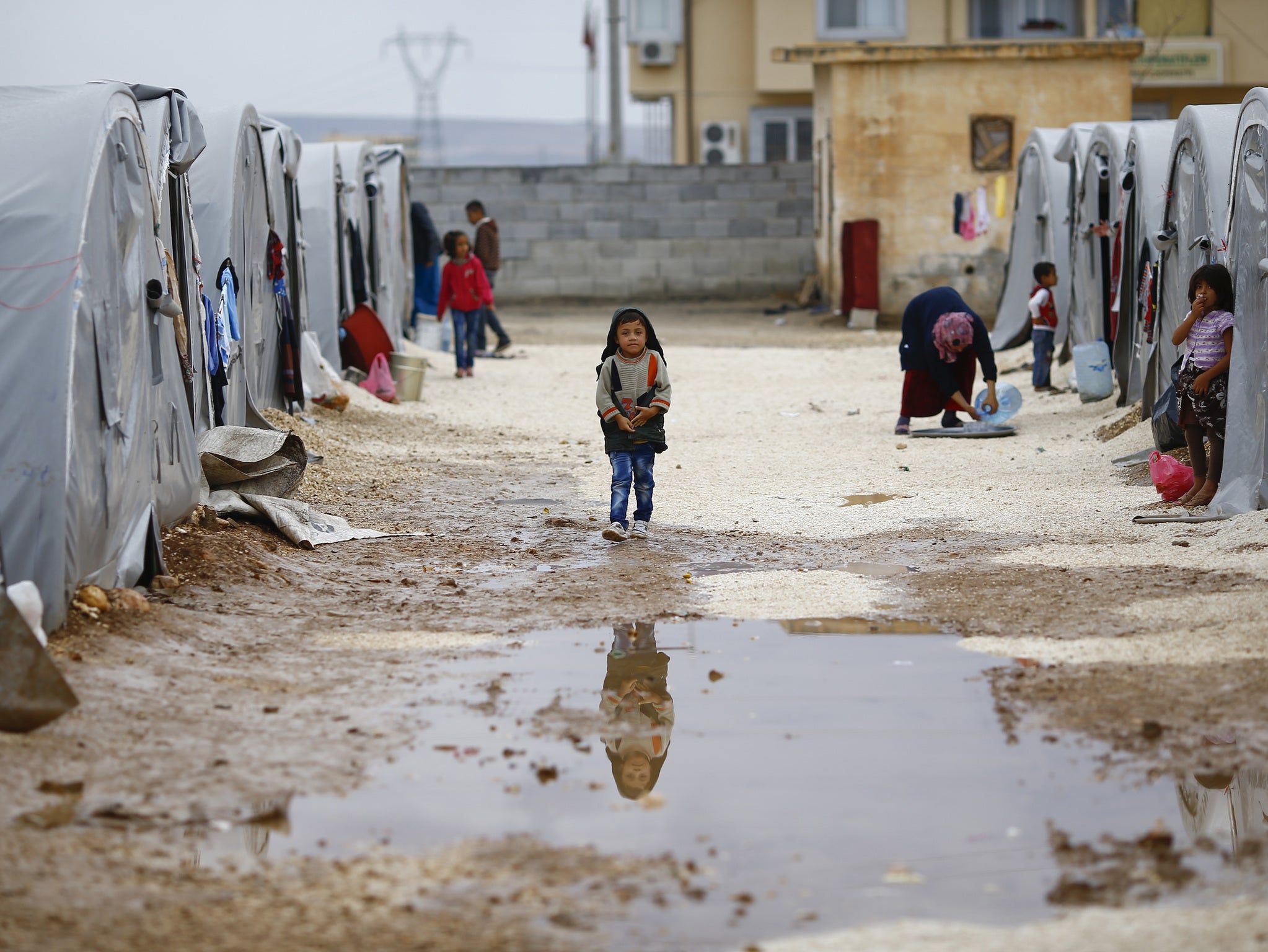 'Western politicians love going to camps to cuddle children and parade compassion, even as they do their damnedest to stop asylum-seekers arriving anywhere near their own doorsteps': A refugee camp on the Turkey-Syria border