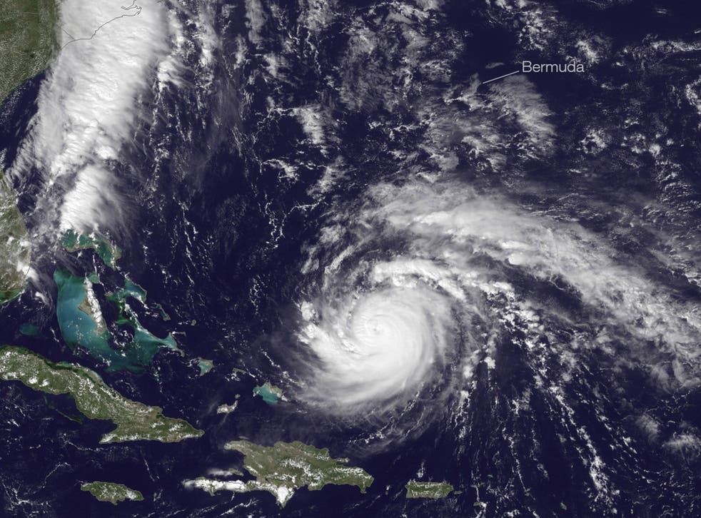 Hurricane Gonzalo gained strength overnight into Thursday as it barreled in the Atlantic toward Bermuda, which was bracing for a hit from the powerful Category Four storm