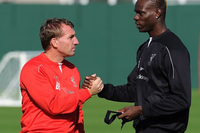 Mario Balotelli says manager Brendan Rodgers plays him as a lone striker for Liverpool while he is used to two
up front 