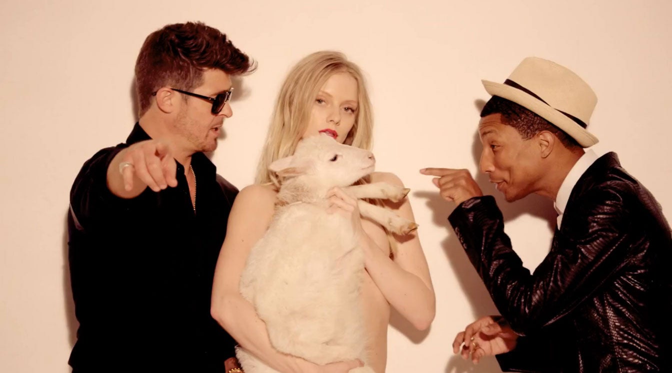 Robin Thicke and Pharrell Williams in the video for 'Blurred Lines'