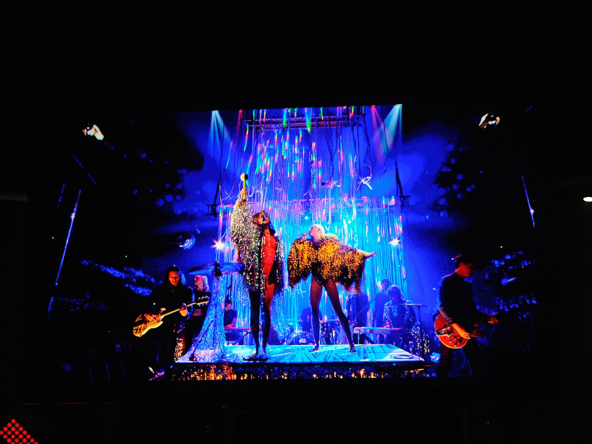 Wayne Coyne of The Flaming Lips performs with Miley Cyrus