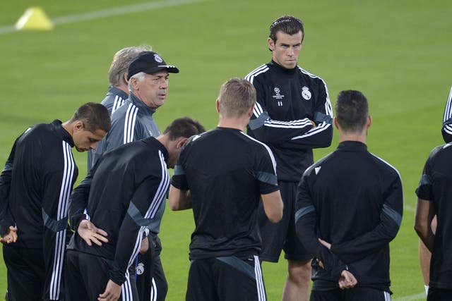 Ancelotti with his squad