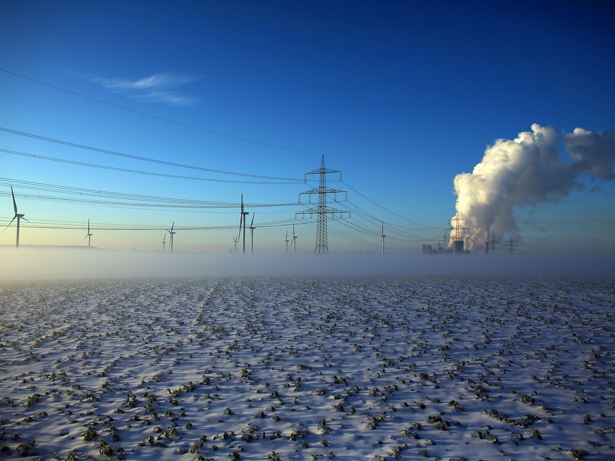 Smoke rises from the Niederaussem Power Station near Bergheim, western Germany