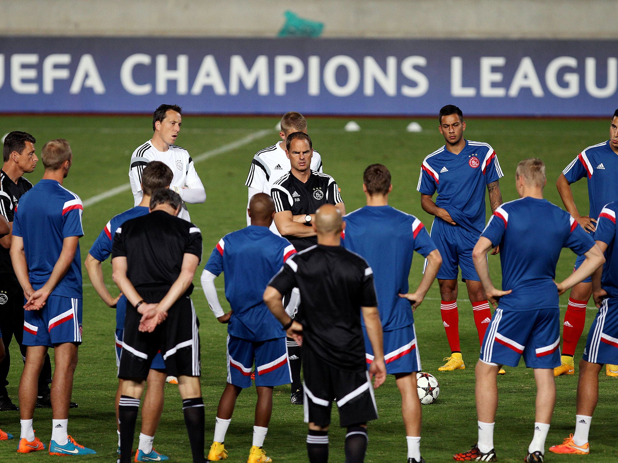 Ajax manager Frank de Boer with his players during training