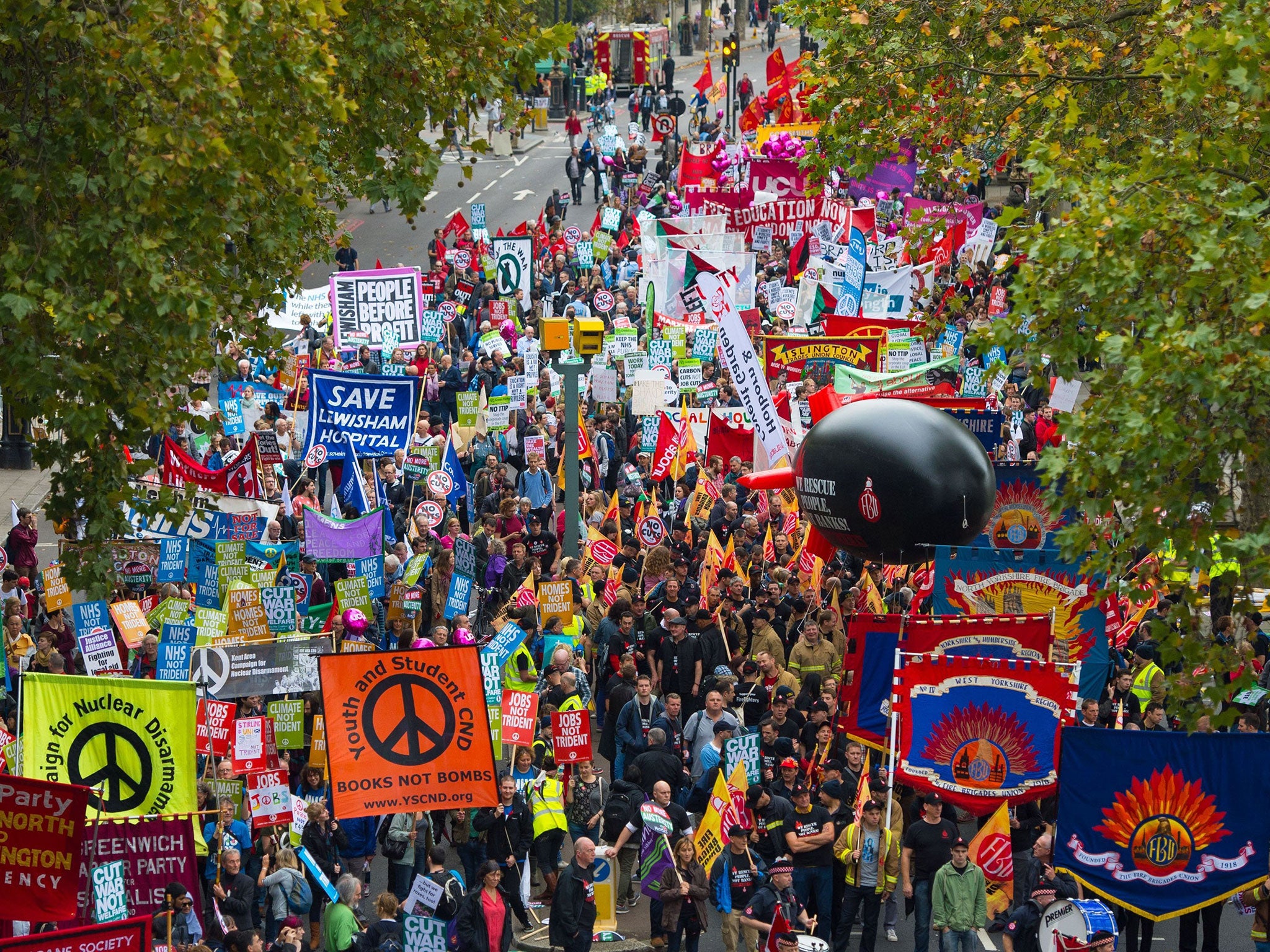 Protesters march through London as part of the TUC 'Britain Needs a Pay Rise' demonstration