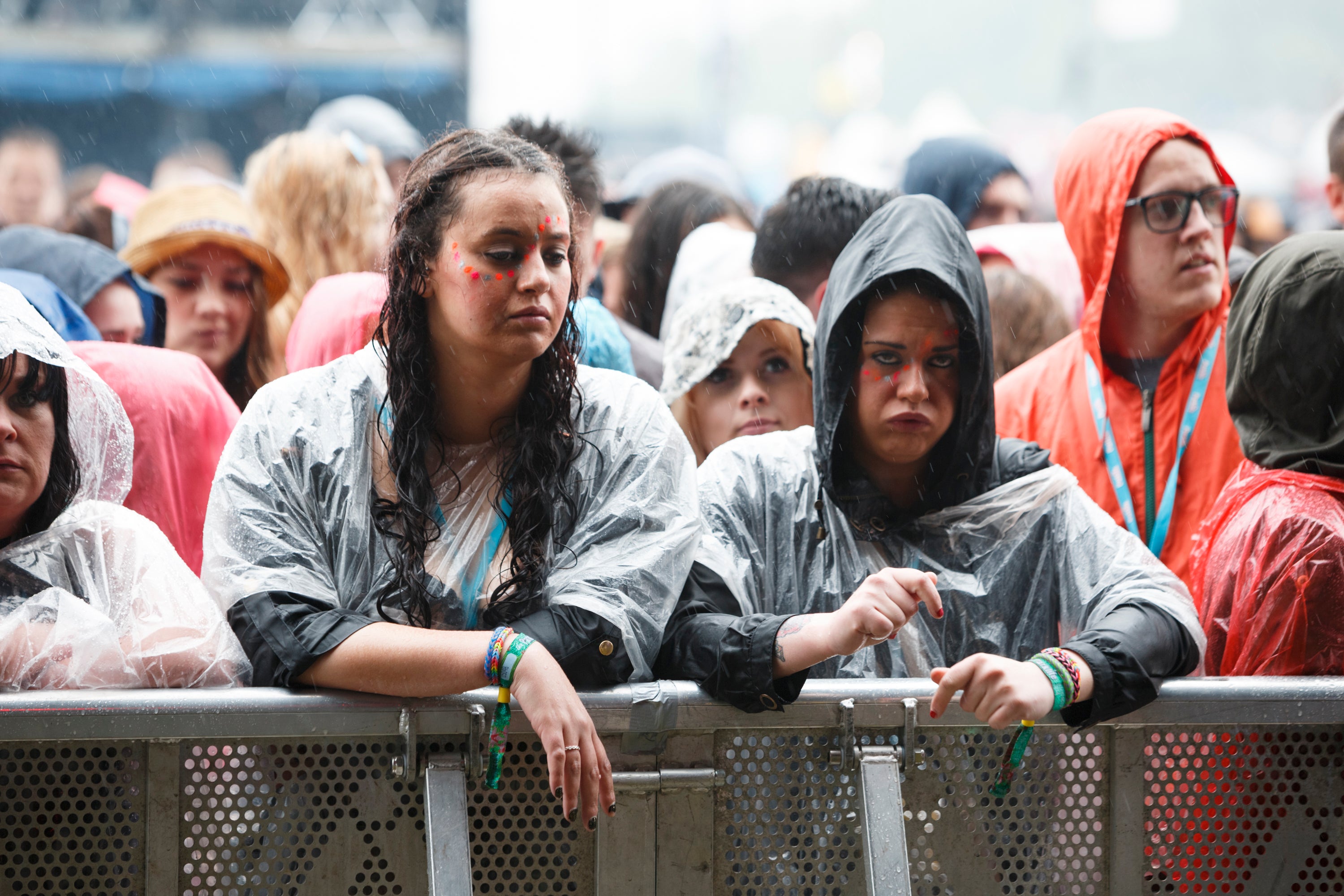 Rain soaks revellers at Parklife Festival at Heaton Park, Manchester, in June 2014.