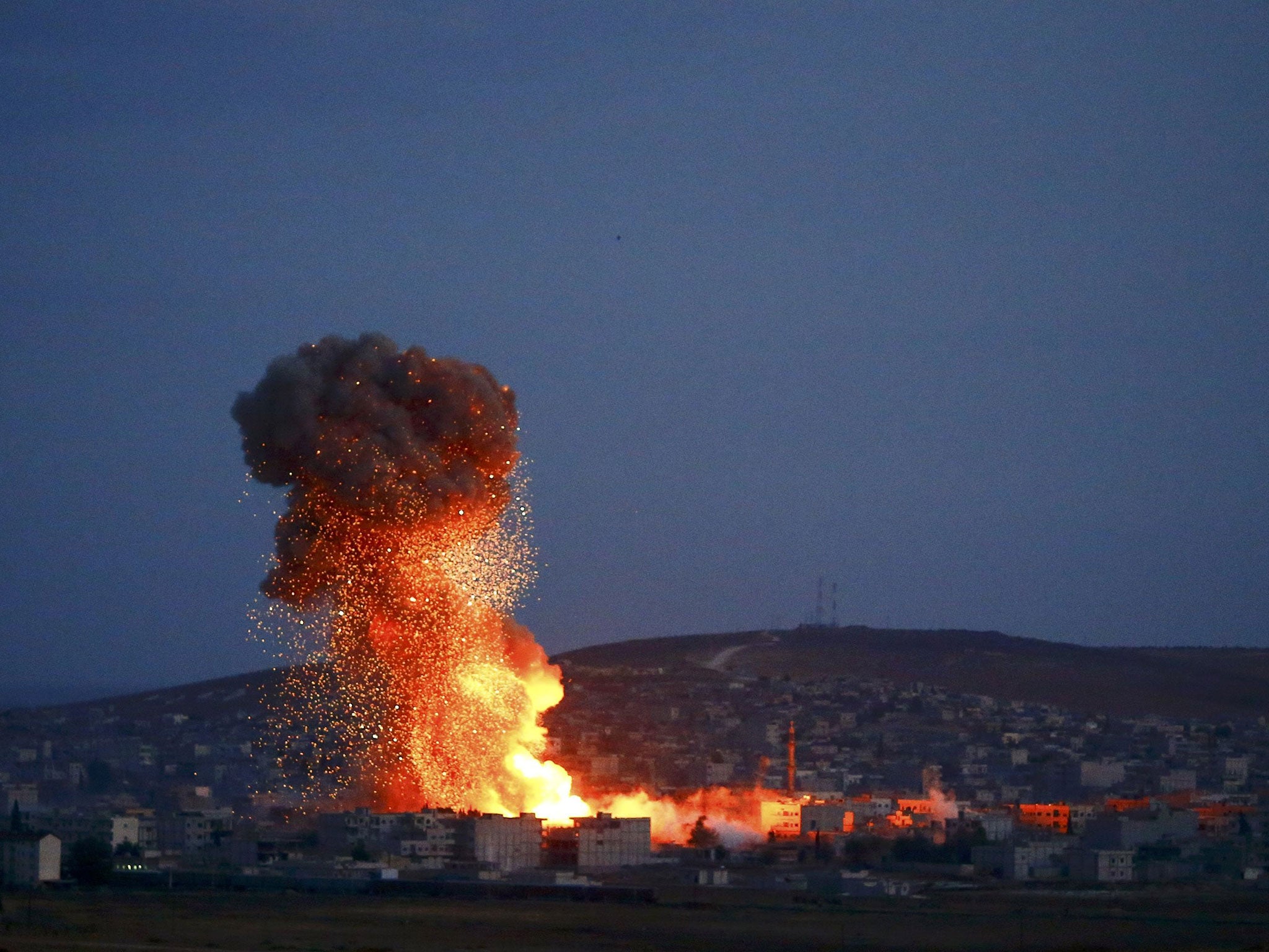 Smoke rises over Kobani following the strikes