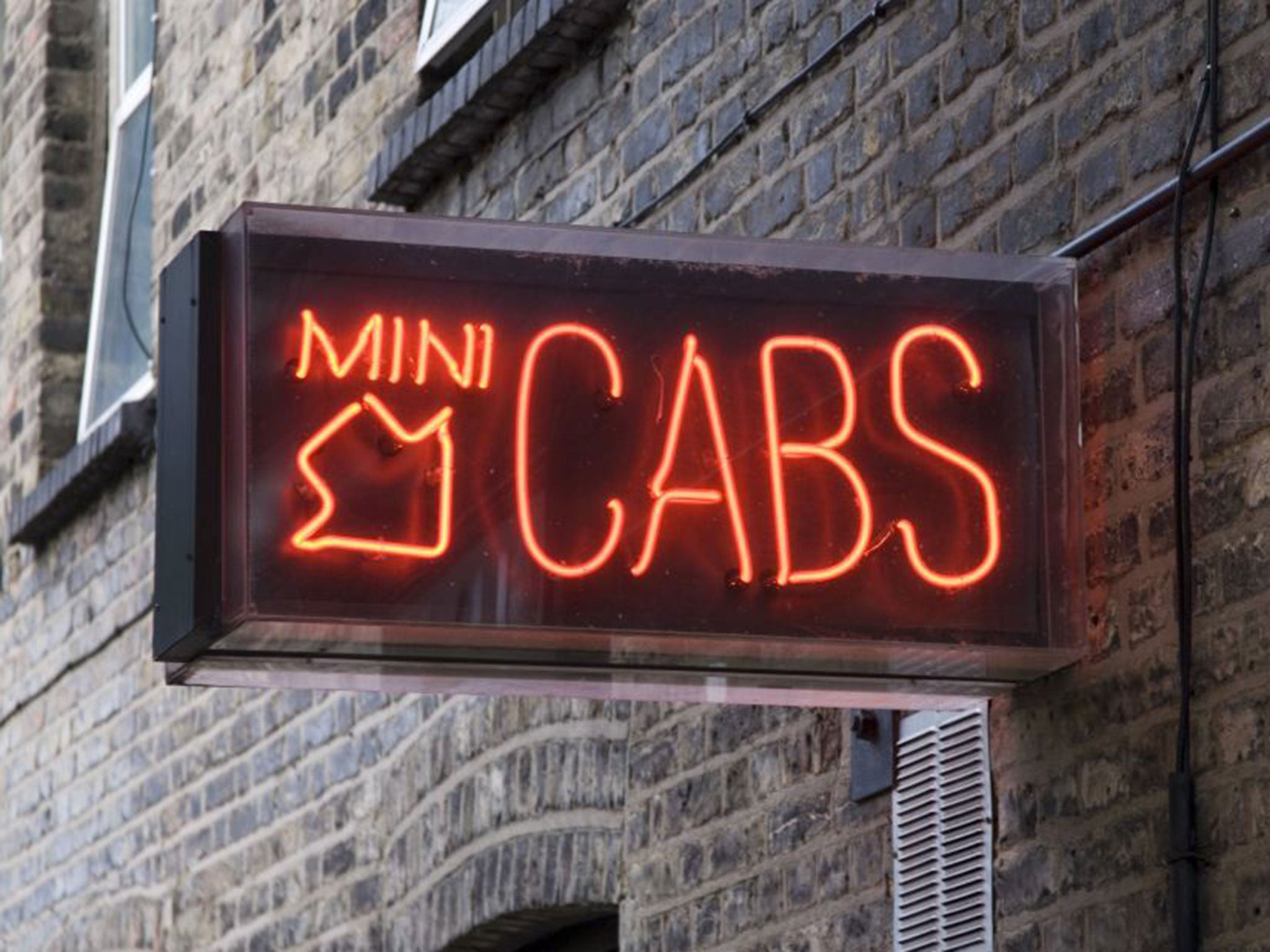 A minicab firm in Rochdale said it has been supplying white drivers to customers on request