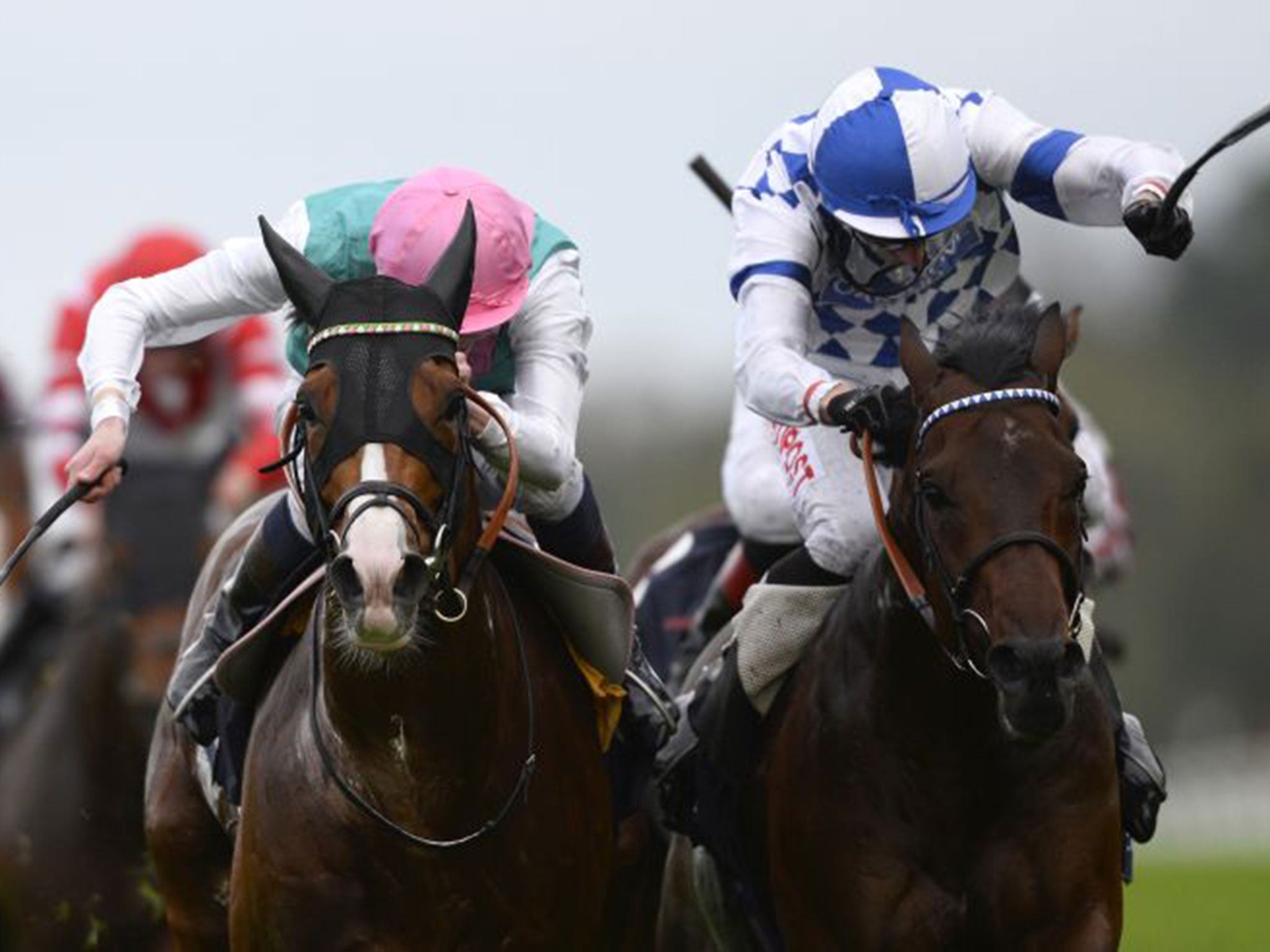 James Doyle on Noble Mission, left, wins The Qipco Champion Stakes by a neck from Al Kazeem at Ascot on Saturday