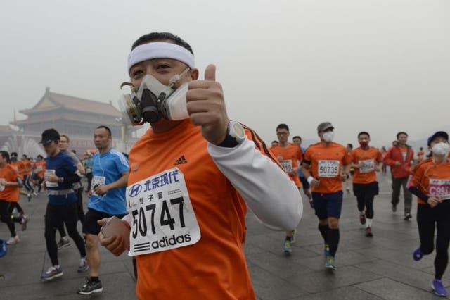 Runners in face masks during the Beijing marathon