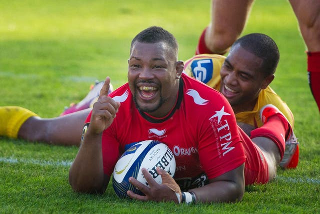 Steffon Armitage celebrates after scoring a try for Toulon against Scarlets