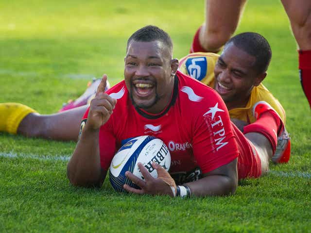 Steffon Armitage celebrates after scoring a try for Toulon against Scarlets