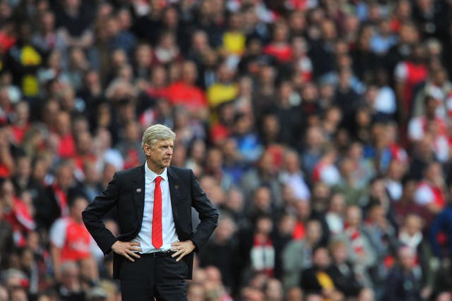 Arsene Wenger looks on during the 2-2 draw with Hull