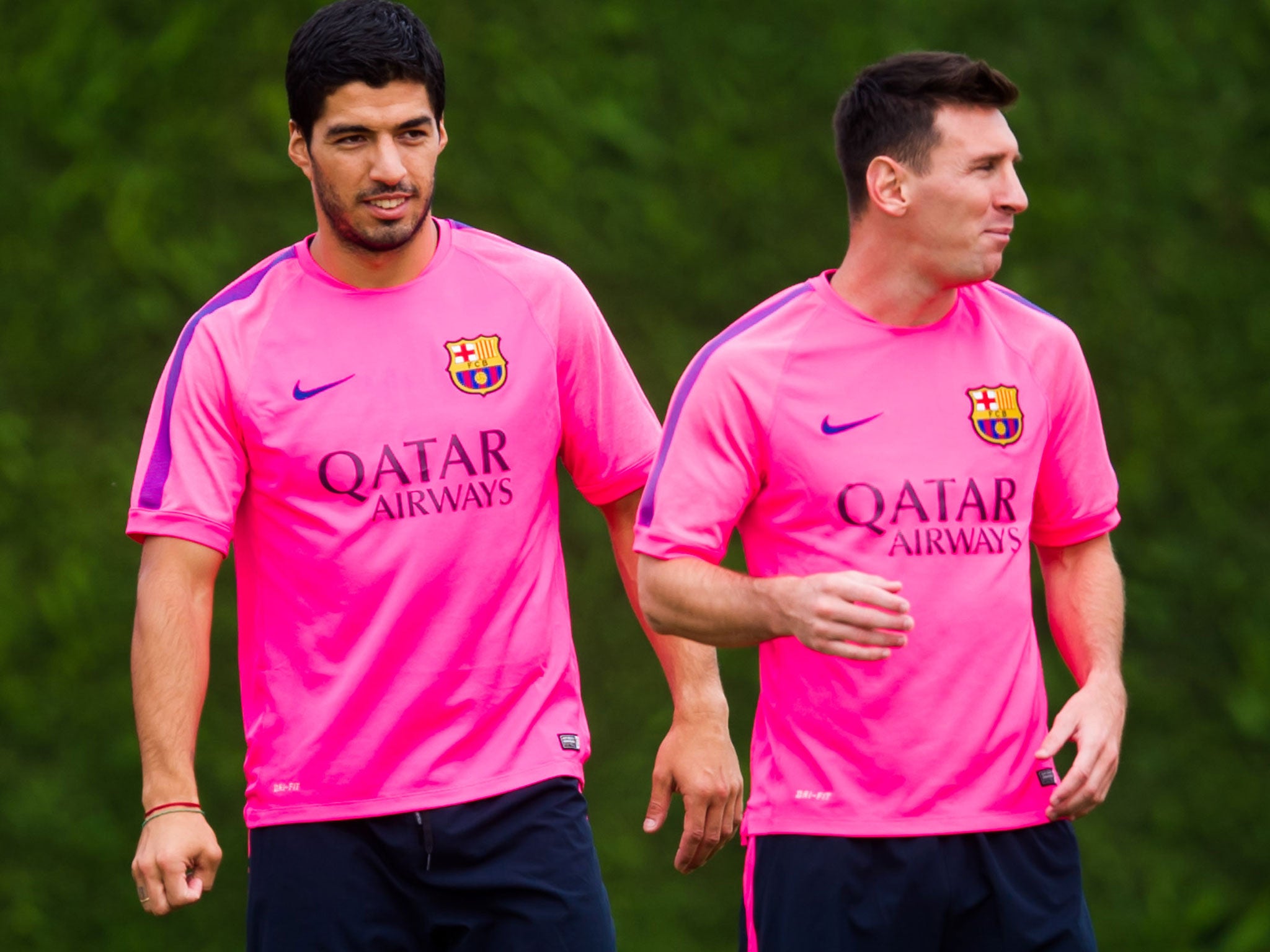 Luis Suarez and Lionel Messi during Barcelona training in August