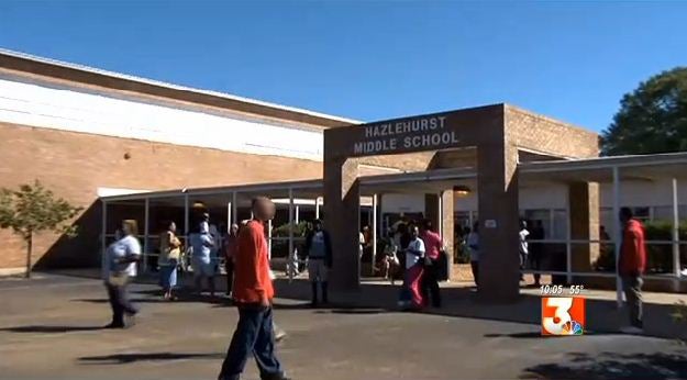 Hundreds of parents removed their children from a school in Mississippi after its principle returned from a trip to Africa