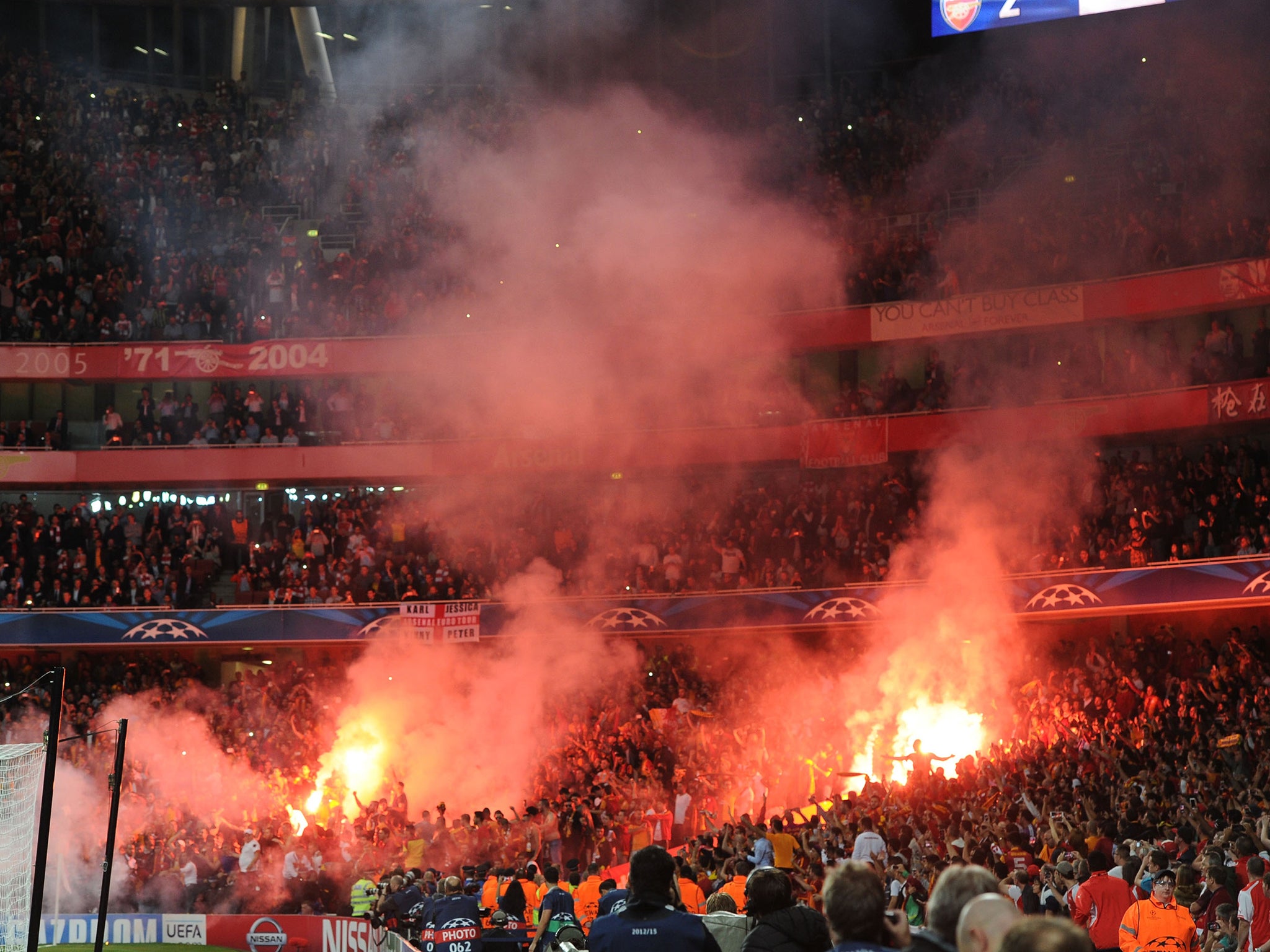 Uefa drop action against Arsenal following fireworks and missiles ...