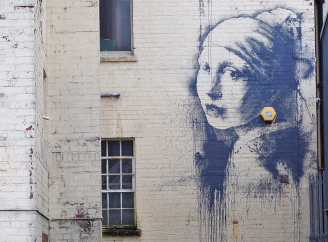 New Banksy 'Girl with the Pierced Eardrum' appears in Bristol – and it ...
